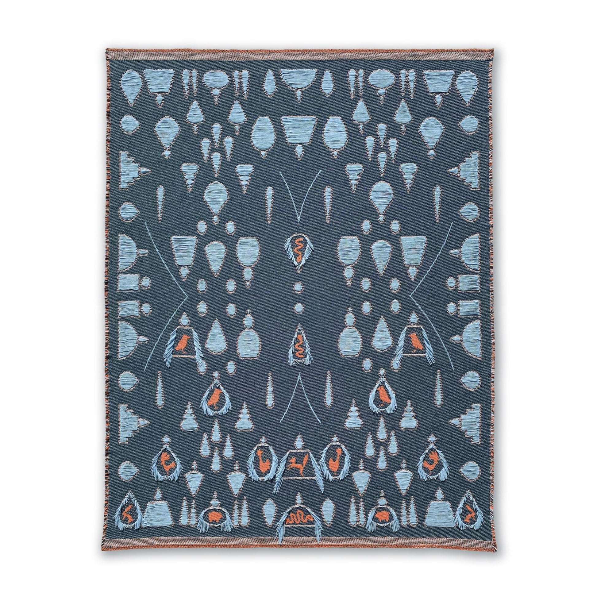 Cotton blanket front view showing topiary garden and animals pattern, designed by Liucija Kostiva